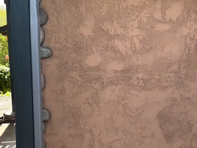 Textured stucco wall at a Santos Construction job site